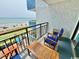 Comfortable balcony seating with views of the beach and ocean at 2001 S Ocean Blvd. # 303, Myrtle Beach, SC 29577