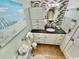 Bathroom featuring vanity with granite countertop, updated backsplash and tiled floor at 2001 S Ocean Blvd. # 303, Myrtle Beach, SC 29577