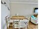 Charming dining area with seating for four and a stylish server at 2001 S Ocean Blvd. # 303, Myrtle Beach, SC 29577