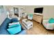 Bright living room with comfortable seating, flat-screen TV, and tile flooring at 2001 S Ocean Blvd. # 303, Myrtle Beach, SC 29577