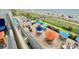 Balcony view of the pool, beach and ocean, and outdoor dining area at 2001 S Ocean Blvd. # 303, Myrtle Beach, SC 29577