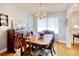 Traditional dining room with wood table, chairs, chandelier, and accent rug at 2004 Seitter St., Georgetown, SC 29440