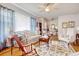 Cozy living room with natural light, ceiling fan, and comfortable seating at 2004 Seitter St., Georgetown, SC 29440
