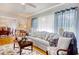 Bright and airy living room with a view to the dining room and hardwood floors at 2004 Seitter St., Georgetown, SC 29440