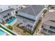 Aerial view showcasing a two-story home with a pool and well-maintained landscaping at 204 33Rd Ave. N, North Myrtle Beach, SC 29582