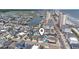 Aerial view of beach homes showcasing neighborhood, nearby waterway and ocean views at 204 33Rd Ave. N, North Myrtle Beach, SC 29582