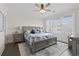 Comfortable bedroom with a large window and decorative lamps on nightstands at 204 33Rd Ave. N, North Myrtle Beach, SC 29582