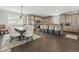 Open concept dining area flowing into the kitchen with elegant seating for eight at 204 33Rd Ave. N, North Myrtle Beach, SC 29582