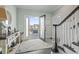 Inviting foyer with coastal decor, a decorative mirror, and an open view to the outdoor balcony at 204 33Rd Ave. N, North Myrtle Beach, SC 29582
