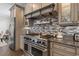 Gourmet kitchen with professional grade stainless steel appliances, granite countertops, and custom cabinetry at 204 33Rd Ave. N, North Myrtle Beach, SC 29582