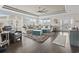 Bright and airy living room with oversized windows and a cozy seating area at 204 33Rd Ave. N, North Myrtle Beach, SC 29582