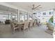 Spacious covered patio with wooden table and chairs, perfect for outdoor dining and entertaining guests at 204 33Rd Ave. N, North Myrtle Beach, SC 29582