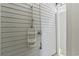 Outdoor shower with shelving, perfect for rinsing off after a day at the beach at 204 33Rd Ave. N, North Myrtle Beach, SC 29582