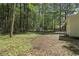 Expansive backyard with mature trees, offering privacy and space for recreation at 203 Deer Trace, Myrtle Beach, SC 29588