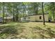 View of backyard with ample space and an access door to the home at 203 Deer Trace, Myrtle Beach, SC 29588