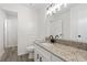 Bathroom with granite countertop, square sink, and modern matte black faucet and hardware at 203 Deer Trace, Myrtle Beach, SC 29588