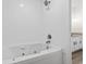 Elegant tiled bathtub with shower head and faucet at 203 Deer Trace, Myrtle Beach, SC 29588