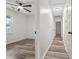 Bedroom with ceiling fan, wood flooring, neutral paint, and lots of natural light at 203 Deer Trace, Myrtle Beach, SC 29588