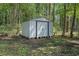 Practical storage shed in the backyard, providing ample space for tools and equipment at 203 Deer Trace, Myrtle Beach, SC 29588