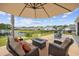 Backyard patio with scenic view of pond and fountain at 205 Longside Ct., Little River, SC 29566