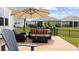 Backyard patio with firepit and seating area at 205 Longside Ct., Little River, SC 29566