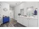 Bright bathroom with dual sinks, modern fixtures, and ample counter space for a functional design at 205 Longside Ct., Little River, SC 29566