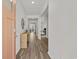 Welcoming entryway showcasing hardwood floors and a decorative console table with mirror at 205 Longside Ct., Little River, SC 29566
