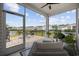 Covered patio with lounge chairs and a scenic view of the pond at 205 Longside Ct., Little River, SC 29566