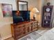 Bedroom featuring a wooden dresser, a flat screen TV and art deco at 2101 S Ocean Blvd. # A-4, North Myrtle Beach, SC 29582