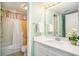 Well-maintained bathroom with ample lighting, white sink vanity, and shower tub combo at 213 Westleton Dr. # 16B, Myrtle Beach, SC 29572