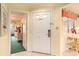 Inviting entrance with a white door, tiled floor, and a view into the living space at 213 Westleton Dr. # 16B, Myrtle Beach, SC 29572
