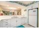 Bright kitchen with white cabinets, quartz countertops, and stainless steel appliances at 213 Westleton Dr. # 16B, Myrtle Beach, SC 29572