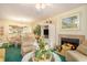 Bright living room featuring a fireplace and seamless flow into the dining area at 213 Westleton Dr. # 16B, Myrtle Beach, SC 29572