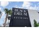 Black Drum Brewing Restaurant featuring outdoor seating and a sleek modern design with palm trees at 213 Westleton Dr. # 16B, Myrtle Beach, SC 29572