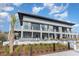 Outdoor seating area with outdoor bar in a well landscaped outdoor area with modern architecture at 213 Westleton Dr. # 16B, Myrtle Beach, SC 29572