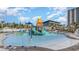 Interactive water park featuring a colorful splash pad with slides and play structures for all ages at 213 Westleton Dr. # 16B, Myrtle Beach, SC 29572