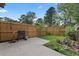 Outdoor space with a wooden fence, patio, landscaping and a barbecue grill at 218 Waccamaw Village Dr. # 218, Myrtle Beach, SC 29579