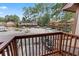 Balcony view overlooking the parking area and other townhome buildings with mature trees at 218 Waccamaw Village Dr. # 218, Myrtle Beach, SC 29579