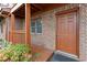 Charming front porch with brick accents, decorative trim, and a well-maintained exterior at 218 Waccamaw Village Dr. # 218, Myrtle Beach, SC 29579