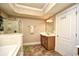 Bright bathroom with a tub, shower, and vanity with modern fixtures at 2180 Waterview Dr. # 635, North Myrtle Beach, SC 29582