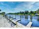 Scenic view of a dock with a river, lush greenery, and beautiful sky at 2180 Waterview Dr. # 635, North Myrtle Beach, SC 29582