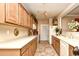 Bright kitchen features wood cabinets, stainless appliances, and tile flooring at 2180 Waterview Dr. # 635, North Myrtle Beach, SC 29582