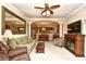 Spacious living room open to the kitchen features a fireplace, TV, and comfortable seating at 2180 Waterview Dr. # 635, North Myrtle Beach, SC 29582