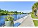 Beautiful waterfront view with lush greenery, a paved walkway, and a serene river at 2180 Waterview Dr. # 635, North Myrtle Beach, SC 29582