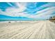 Expansive beach view of the ocean and skyline with tire tracks in the sand at 2310 N Ocean Blvd. # 1107, Myrtle Beach, SC 29577