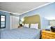 Comfortable bedroom features a queen bed, closet, and stylish decor at 2310 N Ocean Blvd. # 1107, Myrtle Beach, SC 29577
