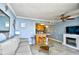 Living room area with fireplace, balcony access and accent wall at 2310 N Ocean Blvd. # 1107, Myrtle Beach, SC 29577