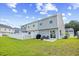 Fenced backyard featuring a patio, grill, and sliding glass door at 238 Christiana Ln. # C, Myrtle Beach, SC 29579
