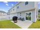 Backyard with covered grill, patio furniture, and sliding glass door at 238 Christiana Ln. # C, Myrtle Beach, SC 29579