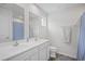 Bathroom with double vanity, ample lighting, and modern fixtures at 238 Christiana Ln. # C, Myrtle Beach, SC 29579